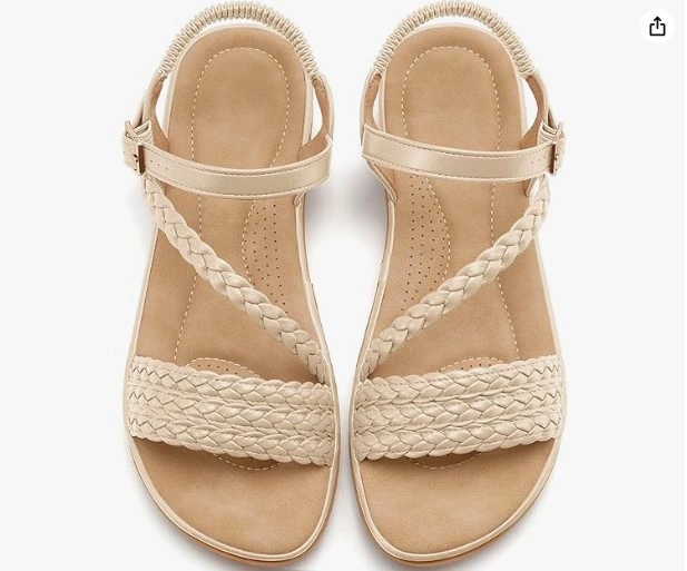 Sometimes the most beautiful shoe is the simplest one. This nude braided flat sandal is the definition of understated elegance — clean, feminine, and endlessly wearable. Here's why it's a must-have: Thick braided straps that add instant texture and style Adjustable ankle buckle for a perfect custom fit Nude/cream colorway that pairs with absolutely everything Flat cushioned sole built for all-day comfort From weekend brunch to beach boardwalks, this sandal goes everywhere and complains never. Pair it with a white sundress for instant vacation energy or cropped linen trousers for that effortless chic look.