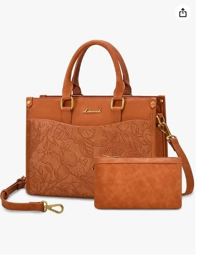 Boho Satchel with Matching Coin Purse If your style is warm, earthy, and full of personality — this is the bag your wardrobe has been missing. The cognac brown leather-look finish has a beautiful floral embossed panel on the front that makes it feel like a boutique find, not a mass-market pick. It comes with a matching mini coin purse — perfect for organizing your cash or keeping as a small clutch. The warm tan tones pair beautifully with fall wardrobes, boho outfits, and everything denim. This bag has character. It tells a story. Why you'll love it The embossed floral detail is what sets this apart from every other brown tote. It's the same silhouette — but with texture and artistry. If you're into boho style or love warm autumn tones, this one is going to become your everyday go-to.