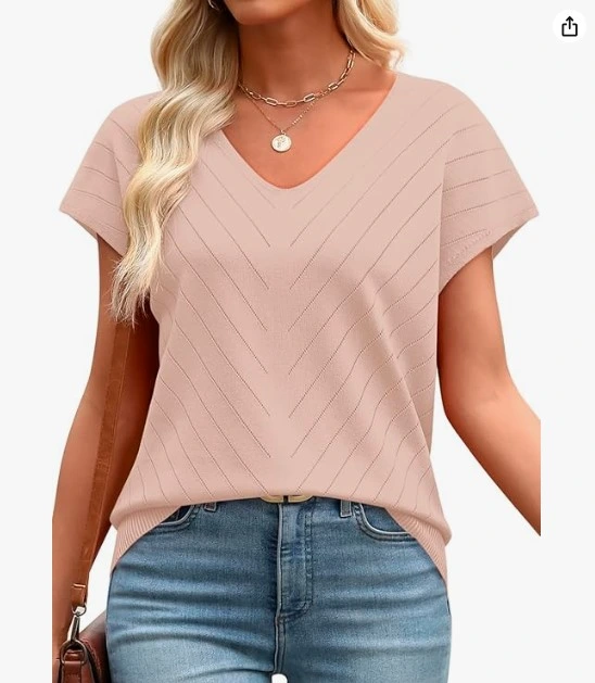 The women's v-neck knit sweater top in dusty rose is everything you want in a summer-to-fall transitional piece. The chevron-textured knit pattern gives it subtle visual interest without going overboard. The short cap sleeves and relaxed v-neckline keep it feminine and flattering. Style it with jeans and a layered necklace — exactly like the model — and you have a polished look in under five minutes. It works for the office, lunch dates, and even light evening events. Why you'll love it: Gorgeous blush pink color that complements all skin tones Chevron knit texture adds elegant detail V-neckline is flattering and versatile Can dress up or down with ease Shop on Amazon